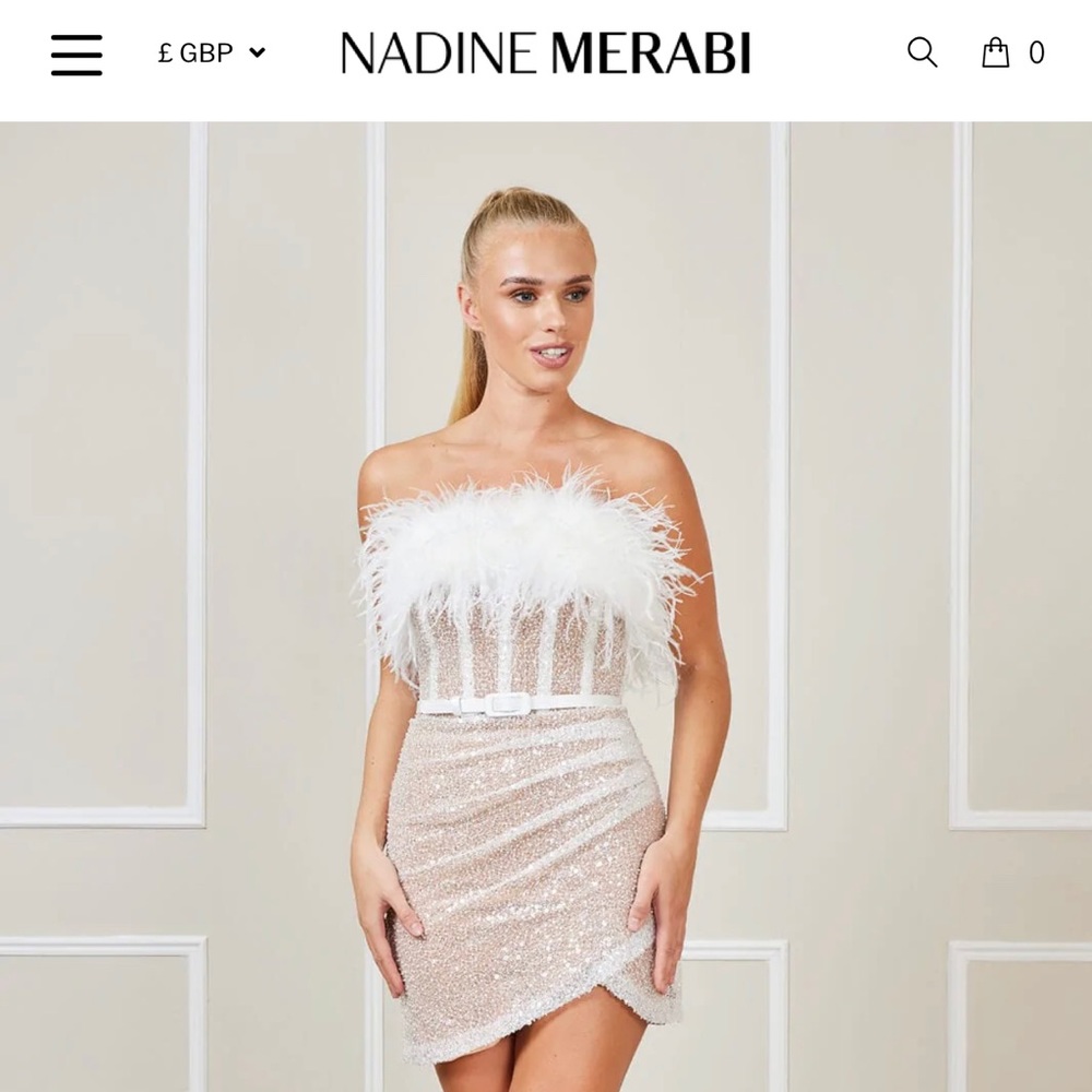 Lightly used, only worn once for a few hours. Beautiful dress.